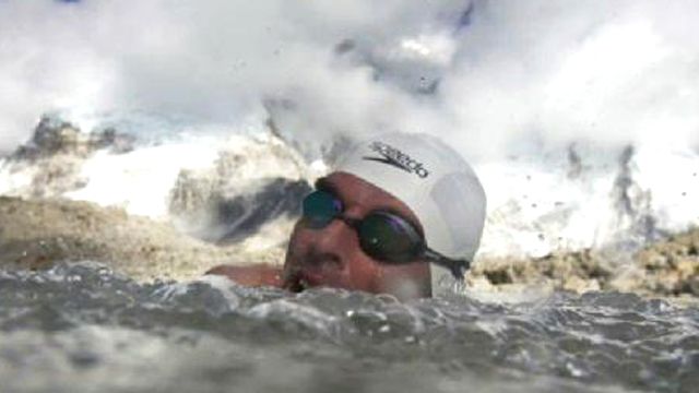 'Human Polar Bear' Completes Record Swim