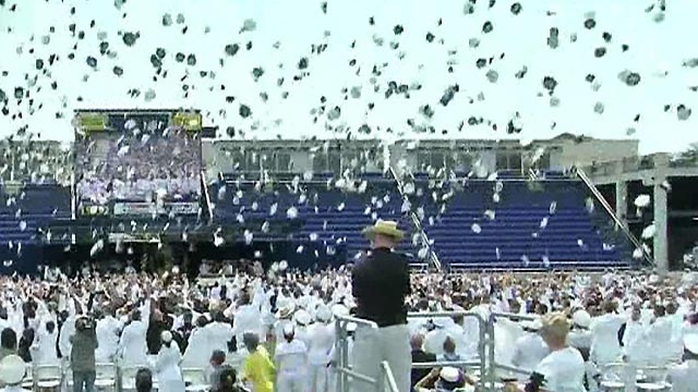 Grads Toss Hats at U.S. Naval Academy