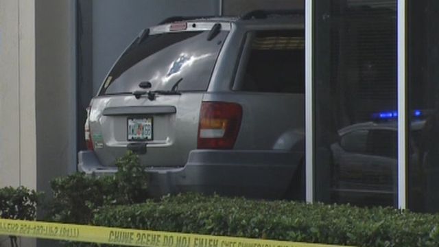 Florida woman crashes her SUV into bank
