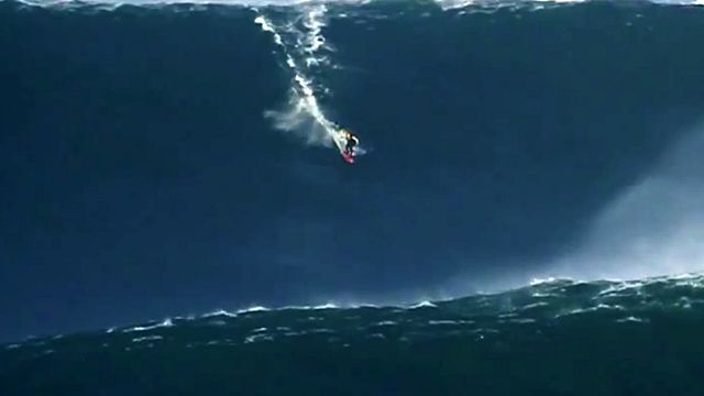 Surfer rides 78-foot wave into record books