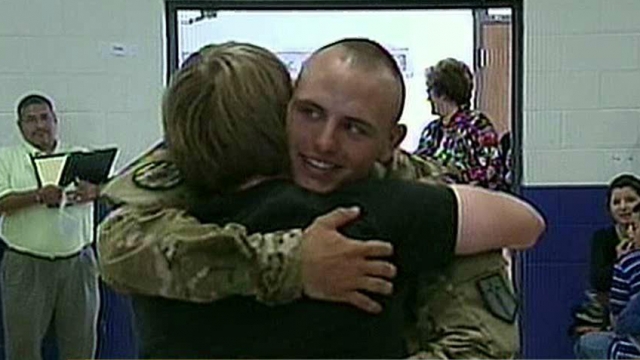 Soldier Surprises Younger Brother