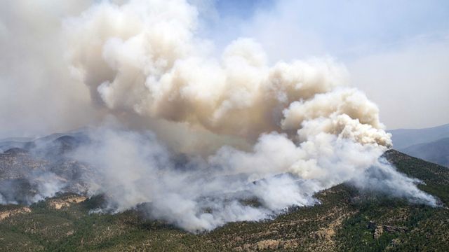 Massive wildfires rage out West