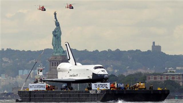 Space shuttle Enterprise arrives at Intrepid