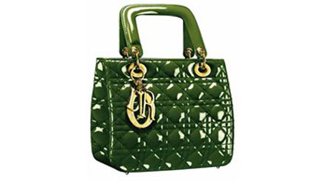 Are women who carry fake designer handbags big trouble?