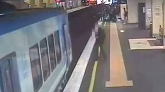 Elderly woman rescued from train tracks