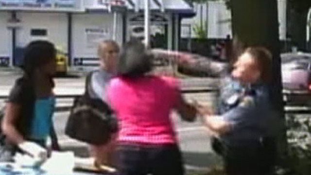 Cop Punches Girl in the Face
