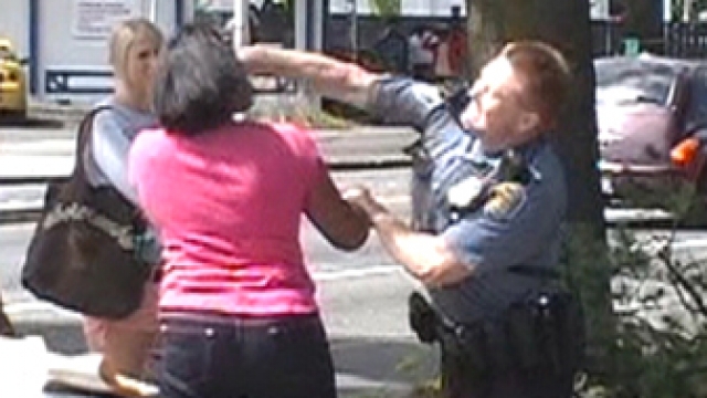 Policeman Punches Teenage Girl