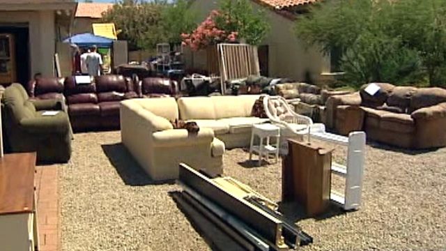 Woman holds yard sale to help save father's life