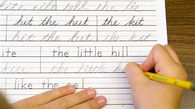 Cursive writing being scribbled out of classrooms