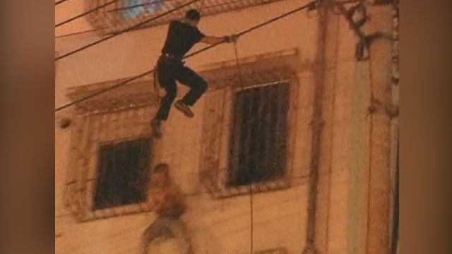 Amazing rescue saves suicidal man on window ledge