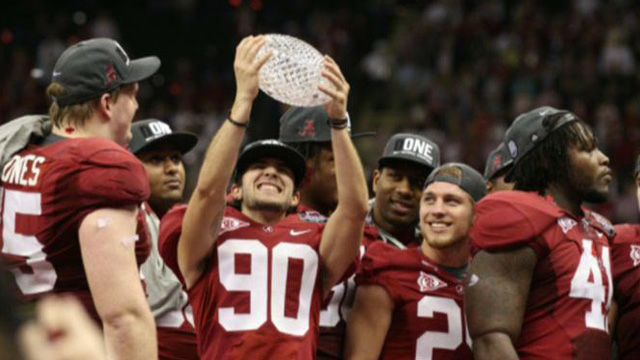 BCS commissioner backs college football playoff system