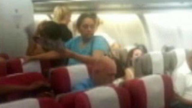 Passengers Trapped on Sweltering Plane