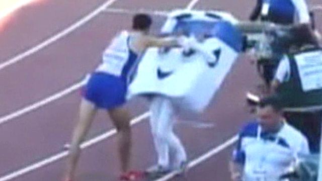 French runner assaults mascot