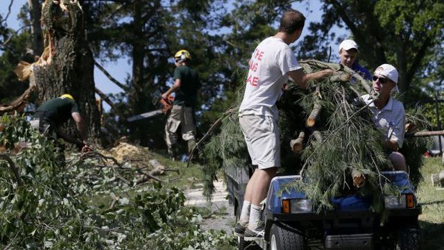 Crews work to clear aftermath of deadly East Coast storms