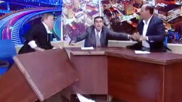 Jordanian lawmaker pulls gun on live TV