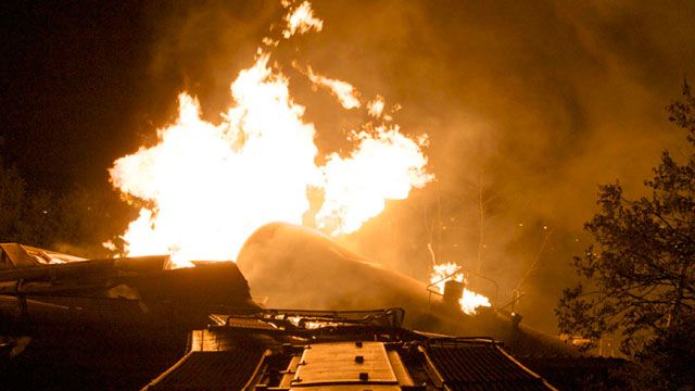Freight train derailment causes fiery blast