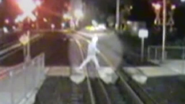 Caught on tape: Pedestrians dodge death on train tracks