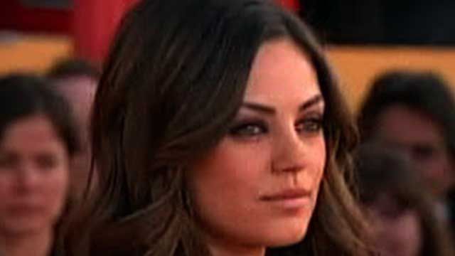 Mila Too Busy to Attend Marine Corps Ball?