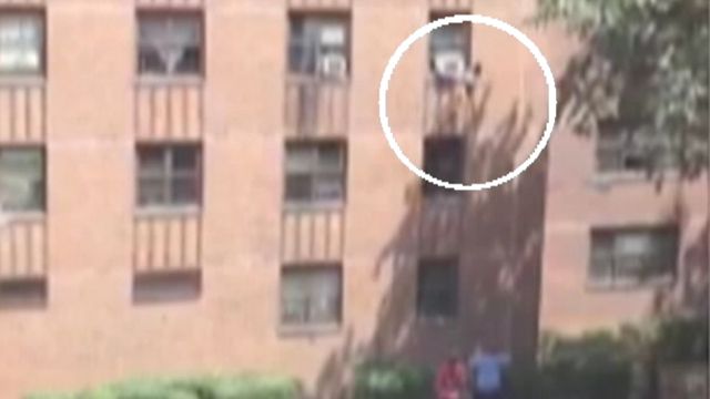Hero catches little girl falling from third-story window