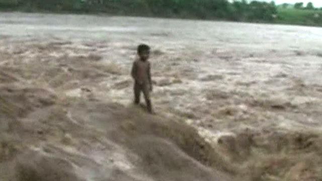 Dramatic Rescue After Boy Stranded by Flash Flooding