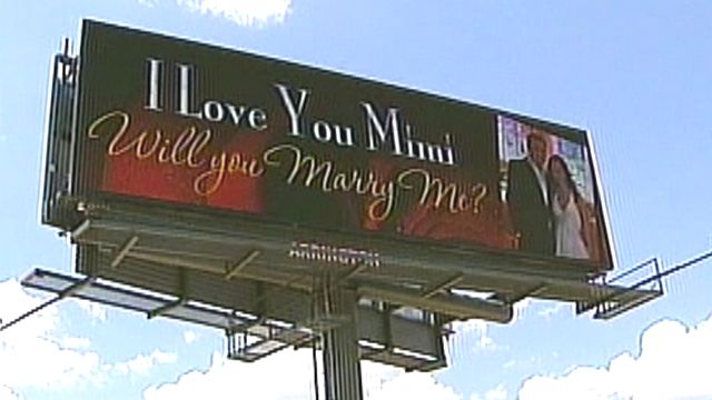 Sign of love: Man proposes with billboard