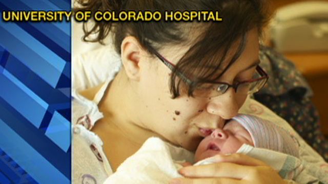 Parents Caught in CO Shooting Have Baby