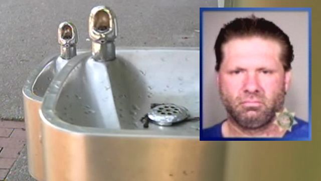 Homeless man washes genitals in public water fountain