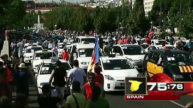 Around the World: Cabs clog traffic in Madrid