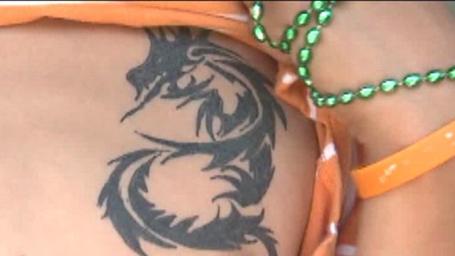13-year-old in trouble for dragon tattoo