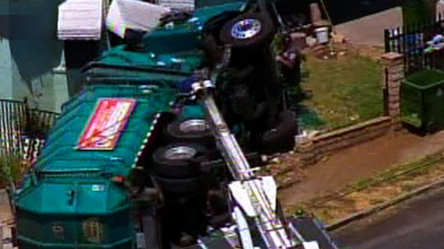 Garbage Truck Overturned in CA