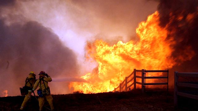 California wildfire destroys at least one home