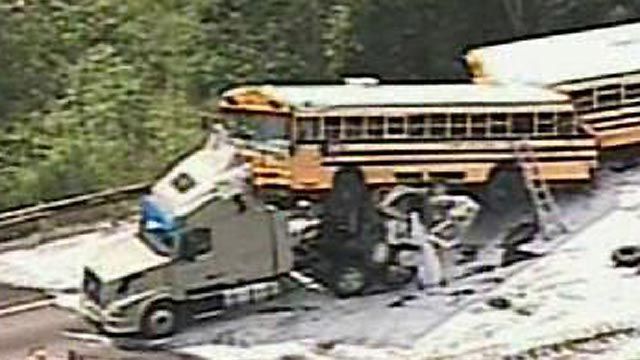 Loaded School Buses Collide With Tractor Trailer