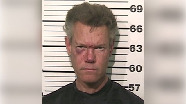 Randy Travis reportedly naked, threatened cops during arrest