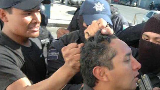 Mexican Cops Arrest One of Their Own 