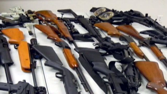 Convicted felon's weapons stash found