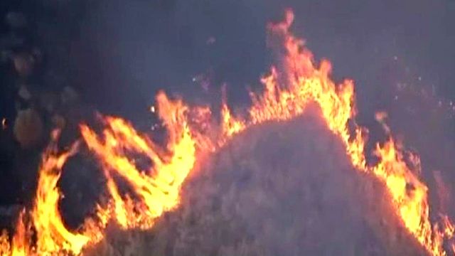 Massive wildfires burn in several Western states
