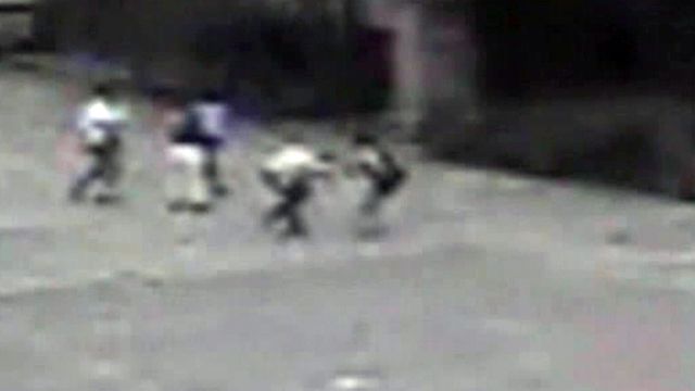 Mob's Attack on Woman Caught on Tape