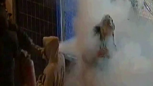 Rioters Assault Innocent Bystander With Fire Extinguisher