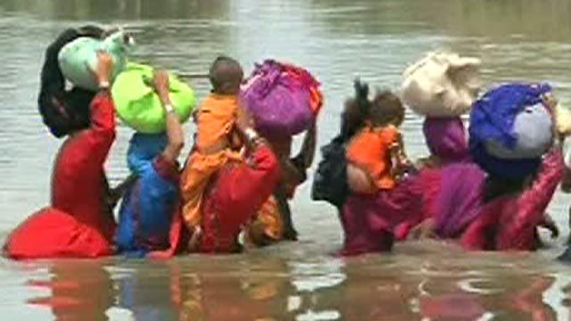 Flood Victims Search for Home