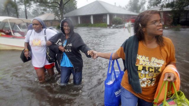 Slow-moving Isaac tests new levees