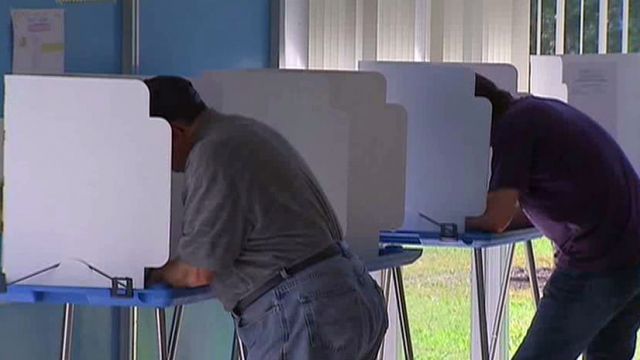 Texas attorney general vows appeal of voter ID law ruling