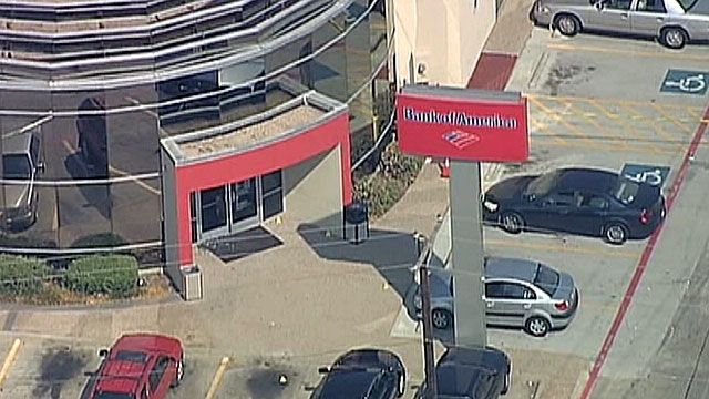 Guard Shot, Killed in Bank Robbery