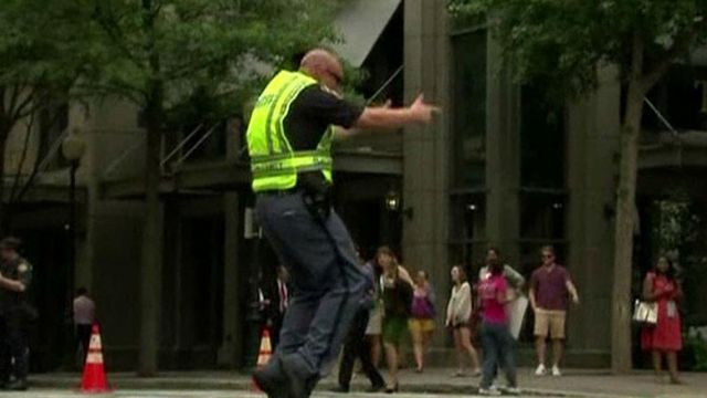 Charlotte traffic cop entertains drivers