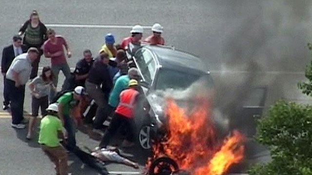 Bystanders Free Man Trapped Under Burning Car