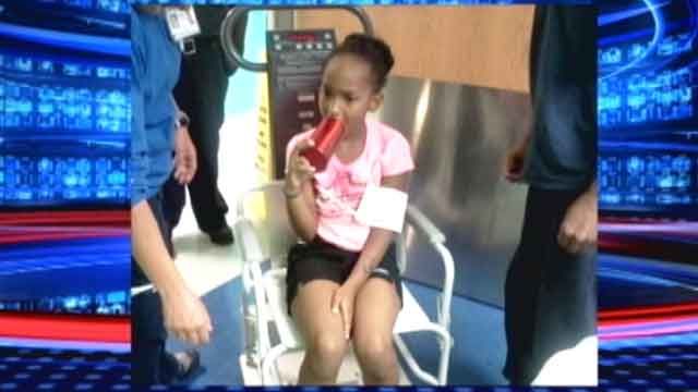 8-year-old gets tongue stuck inside water bottle