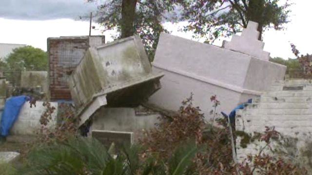 Graves unearthed during Hurricane Isaac