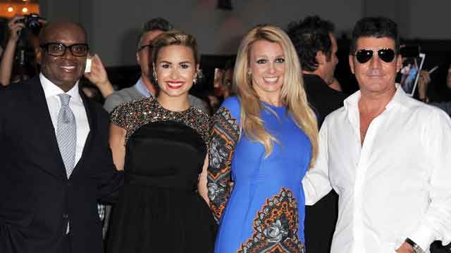 Britney, Lovato get comfortable with Simon