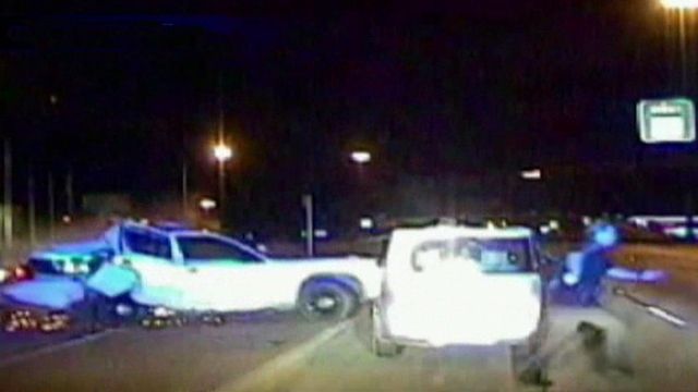 Cop saves woman from out-of-control car