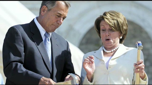 SHOT OF THE DAY: John Boehner Helps a Shocked Nancy Pelosi Hammer in a Bi-Partisan Nail