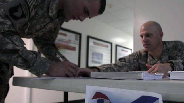 New report raises concerns over helping troops overseas vote